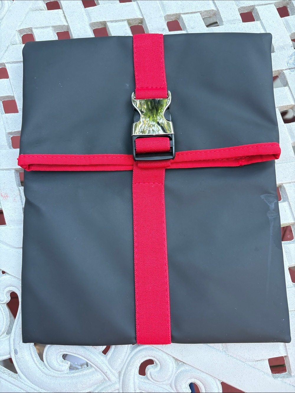 Prada Luna Rossa Jet Set Toiletry.
Bag featuring a black & Red nylon bag